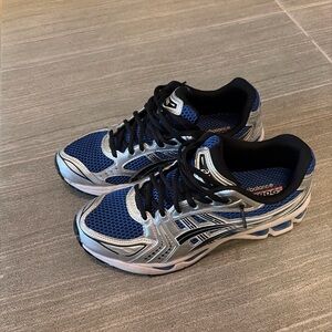 New Balance Blue and Silver Athletic Shoes